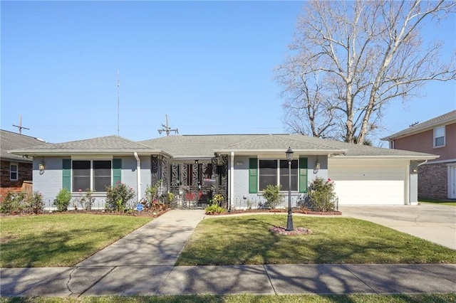 ranch-style house with brick siding, a garage, a front lawn, and driveway