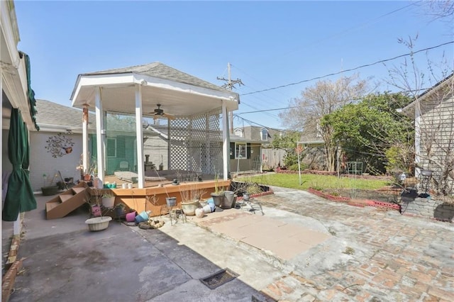 view of patio / terrace featuring ceiling fan