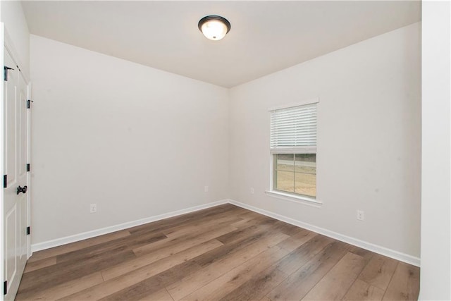 20069 Narretto Rd, Loranger, LA 70446 - unfurnished room featuring wood-type flooring and baseboards