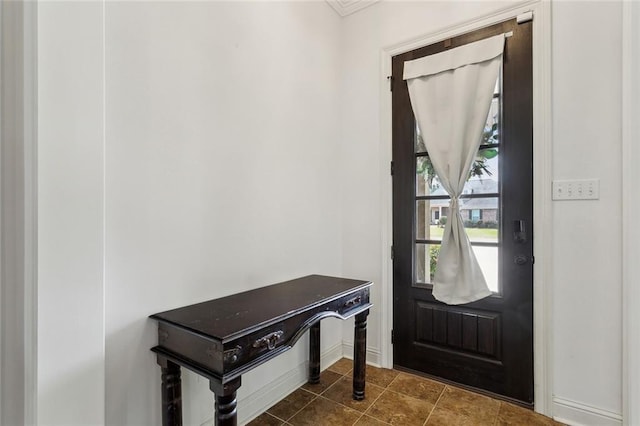 foyer entrance with baseboards