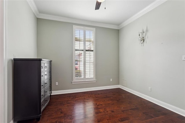 empty room with baseboards, plenty of natural light, ceiling fan, and hardwood / wood-style flooring