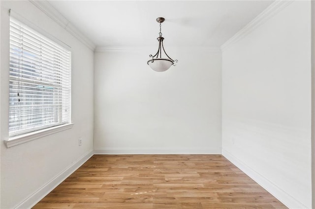 3000 July St Unit 2115, Baton Rouge, LA 70808 - unfurnished dining area with baseboards, light wood-style floors, and crown molding