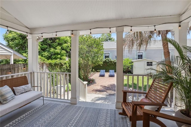 view of patio featuring outdoor lounge area and an outdoor structure