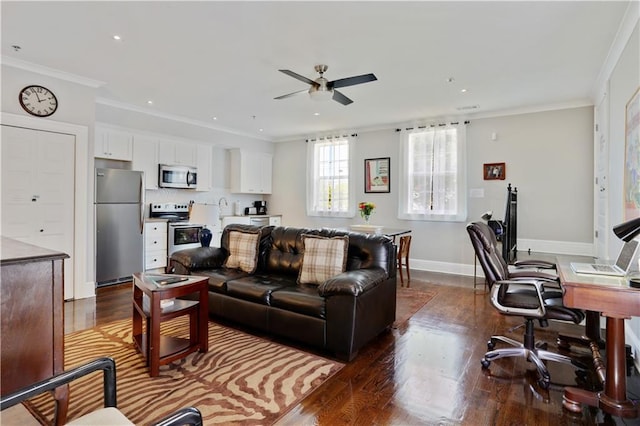 living area featuring a ceiling fan, dark wood-style flooring, and ornamental molding