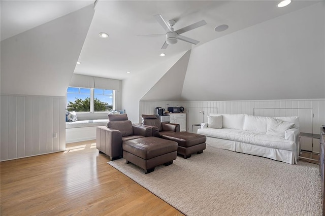 living room featuring recessed lighting, wood finished floors, a wainscoted wall, and ceiling fan