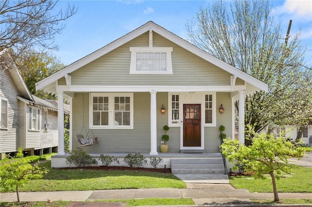 bungalow featuring covered porch