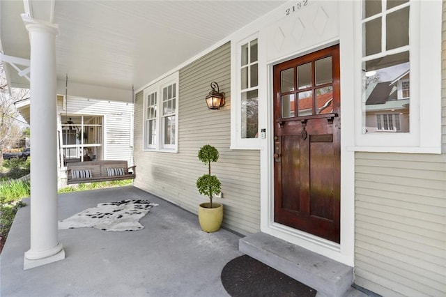 entrance to property with covered porch