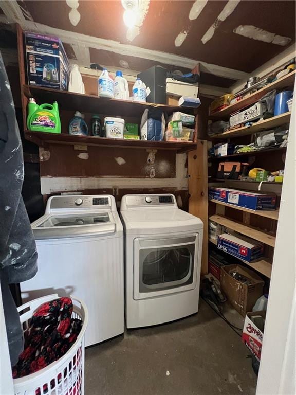 laundry area featuring laundry area and washer and clothes dryer