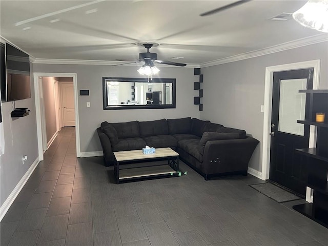 living area with crown molding, a ceiling fan, baseboards, and wood finish floors