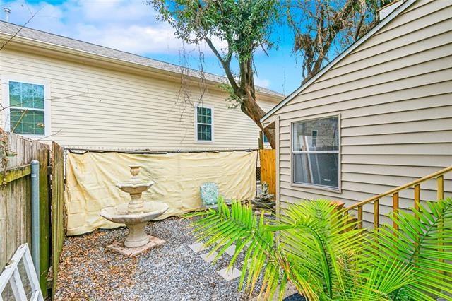 view of yard with visible vents and fence