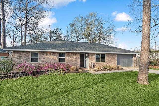 ranch-style home with brick siding, an attached garage, driveway, and a front yard