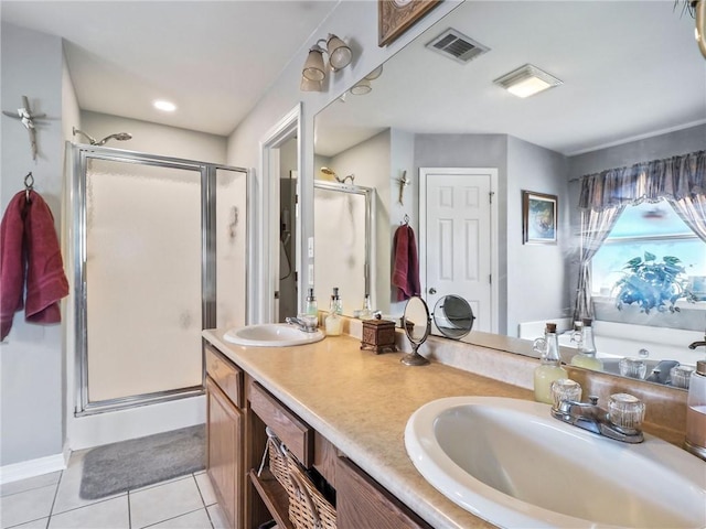 31501 River Pines Dr, Springfield, LA 70462 - bathroom with visible vents, a sink, tile patterned flooring, and a shower stall