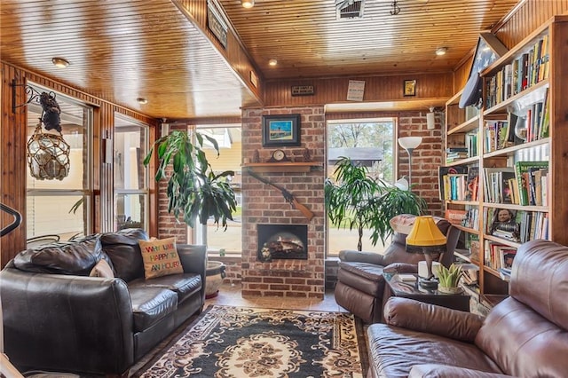 31501 River Pines Dr, Springfield, LA 70462 - living room with plenty of natural light and a brick fireplace