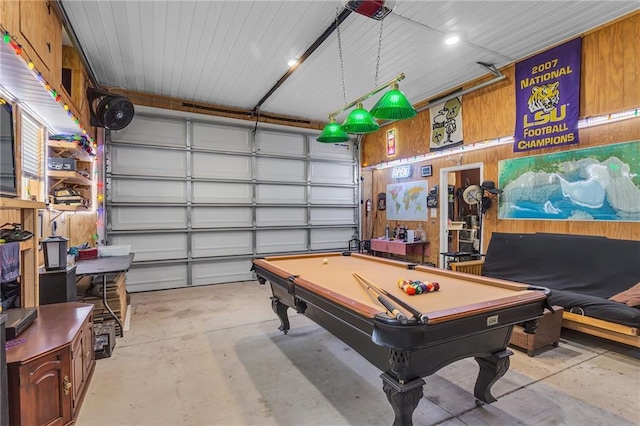 playroom with billiards, a garage, and concrete floors