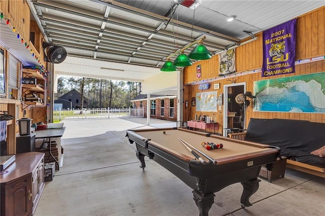 31501 River Pines Dr, Springfield, LA 70462 - rec room featuring billiards, wood walls, and concrete floors