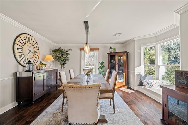 202 Doby Dr, Mandeville, LA 70448 - dining space featuring dark wood-style flooring and ornamental molding