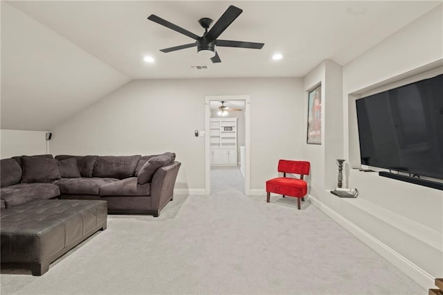 living area with baseboards, lofted ceiling, light carpet, recessed lighting, and a ceiling fan