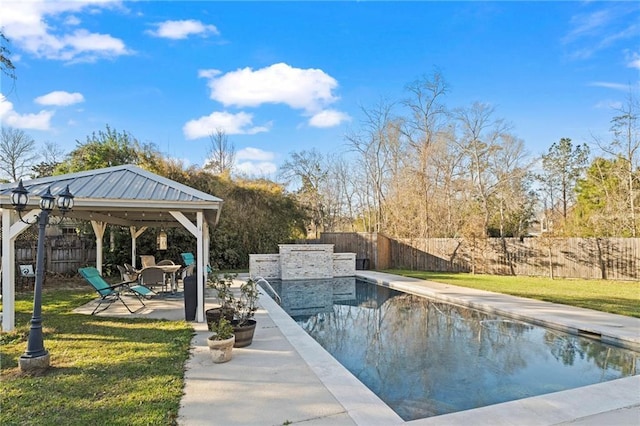 view of swimming pool featuring a gazebo, a patio, a lawn, and a fenced backyard