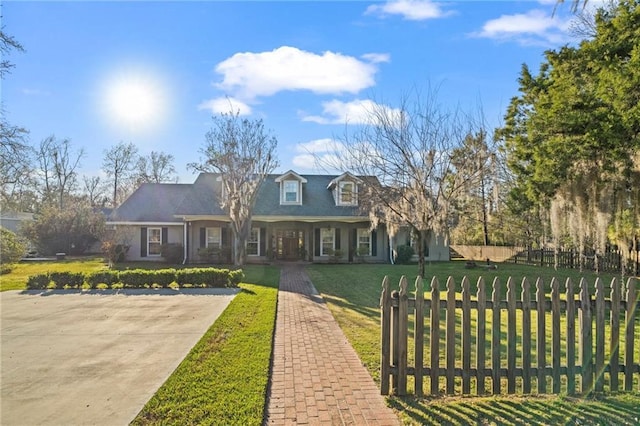 202 Doby Dr, Mandeville, LA 70448 - new england style home featuring covered porch