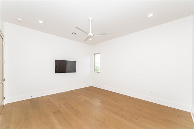 unfurnished room featuring recessed lighting, a ceiling fan, baseboards, and light wood finished floors