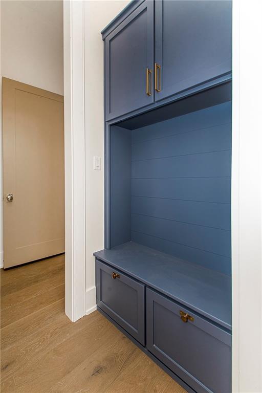 mudroom with light wood-type flooring