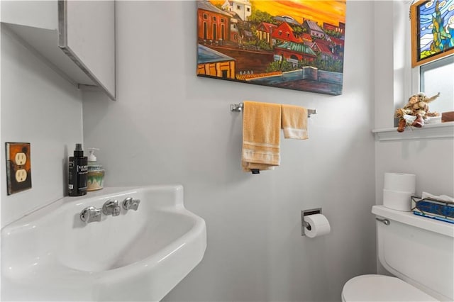 bathroom with a sink and toilet