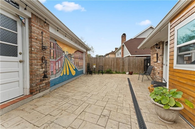 view of patio / terrace with fence