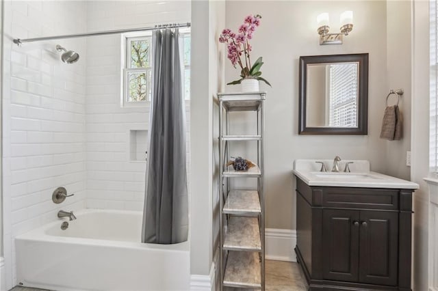 bathroom with vanity and shower / tub combo