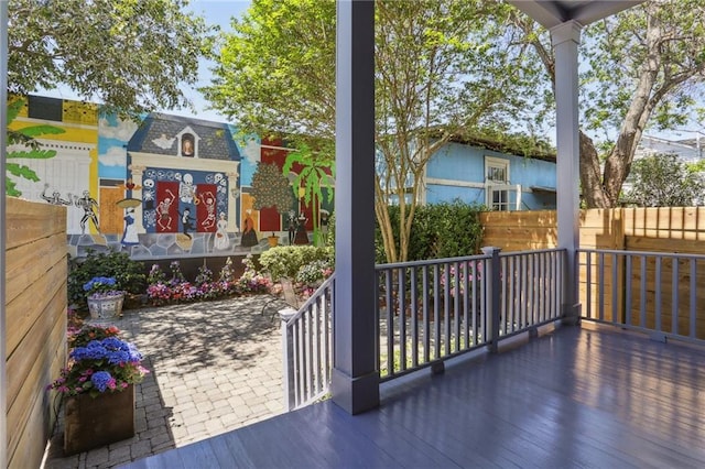 view of patio / terrace featuring fence