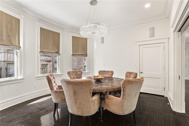 dining area with baseboards, a chandelier, dark wood finished floors, and ornamental molding