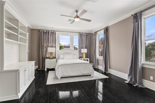 bedroom featuring visible vents, crown molding, dark wood-type flooring, baseboards, and a ceiling fan