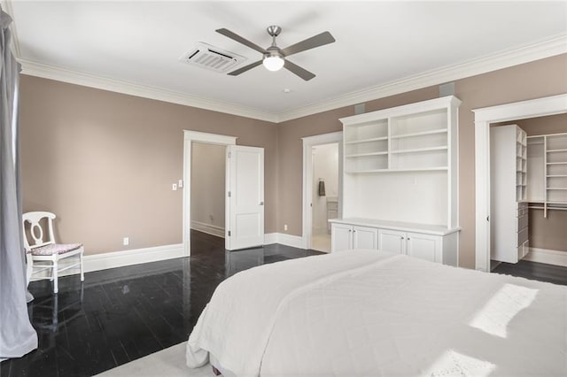 bedroom featuring dark wood-style floors, visible vents, and baseboards