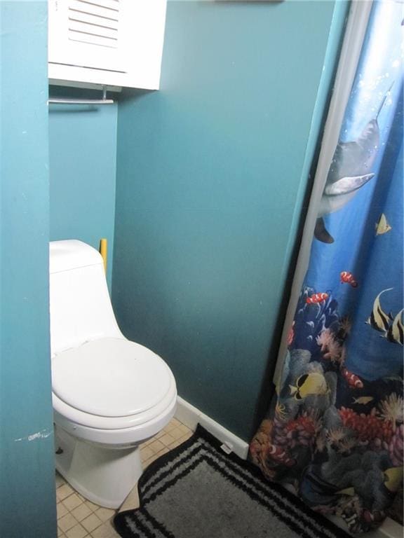 314 Halsey Dr, Harahan, LA 70123 - bathroom featuring toilet and a shower with curtain