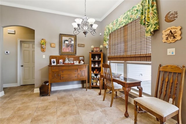 dining room with ornamental molding, arched walkways, an inviting chandelier, light tile patterned flooring, and baseboards