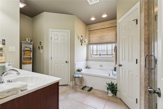 bathroom with a shower with shower door, visible vents, tile patterned flooring, a bath, and vanity