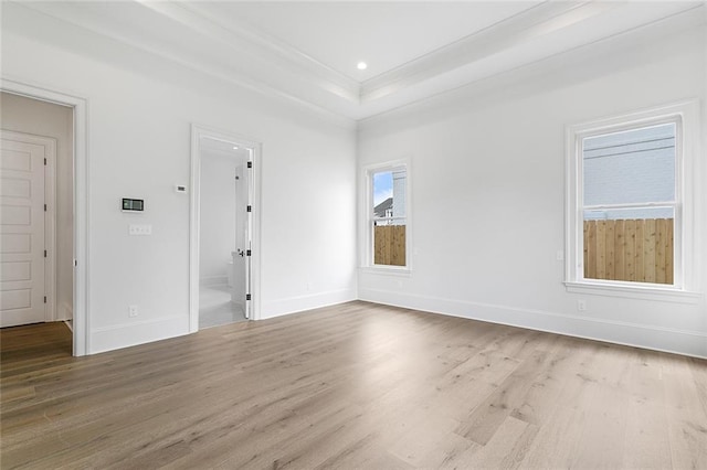 11 Khan Ct, Metairie, LA 70003 - unfurnished room with wood finished floors, a tray ceiling, recessed lighting, and crown molding