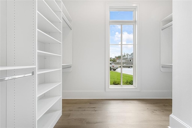 11 Khan Ct, Metairie, LA 70003 - spacious closet featuring wood finished floors