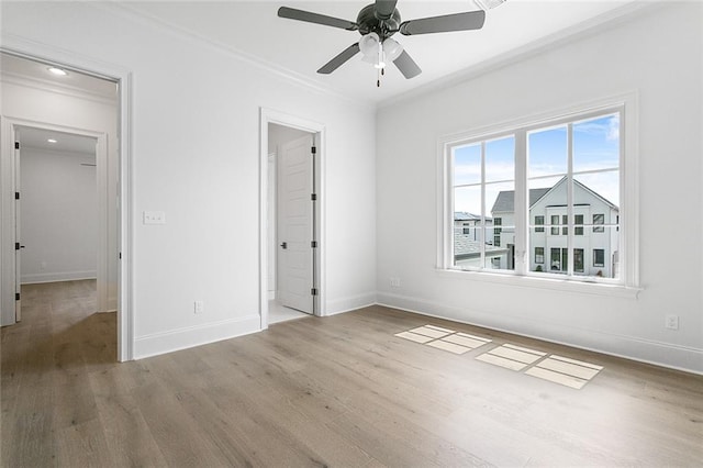 11 Khan Ct, Metairie, LA 70003 - unfurnished bedroom featuring wood finished floors, ornamental molding, baseboards, recessed lighting, and ceiling fan