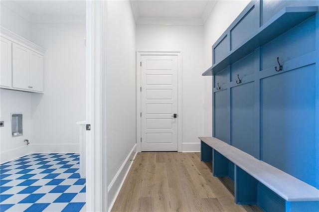 11 Khan Ct, Metairie, LA 70003 - mudroom featuring crown molding and light wood-style flooring