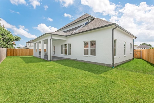 11 Khan Ct, Metairie, LA 70003 - back of property with a shingled roof