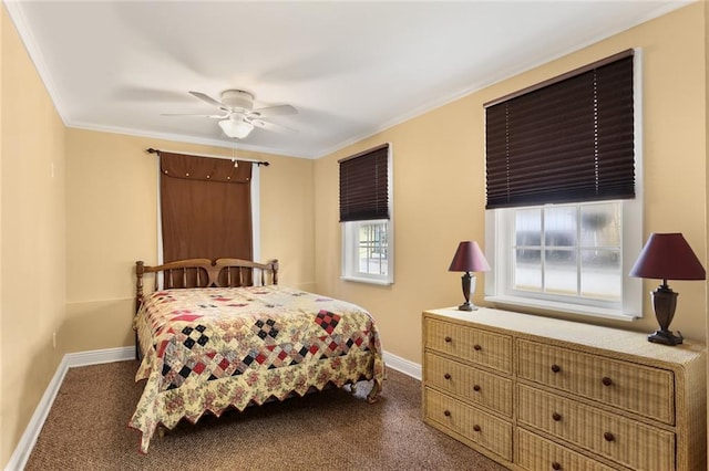 bedroom featuring dark carpet, ceiling fan, baseboards, and ornamental molding