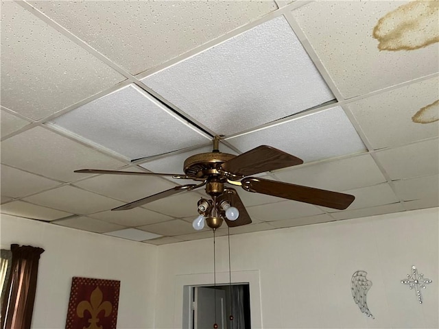 details featuring a paneled ceiling and ceiling fan