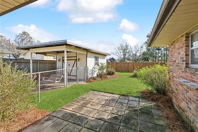 view of yard featuring a fenced backyard and a patio area