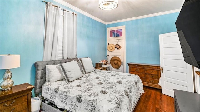 bedroom featuring crown molding and dark wood-style floors