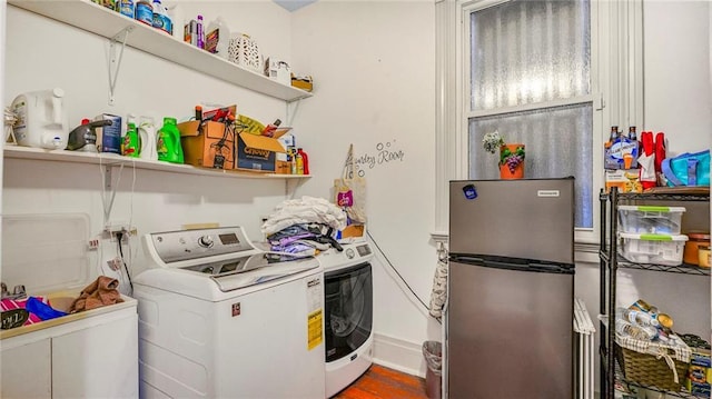 laundry area with laundry area and baseboards