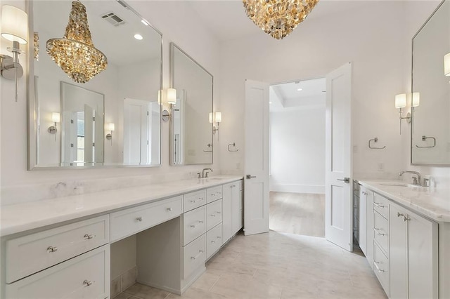 315 Sena Dr, Metairie, LA 70005 - full bath featuring visible vents, an inviting chandelier, recessed lighting, and vanity