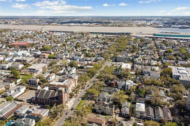 bird's eye view featuring a residential view and a water view