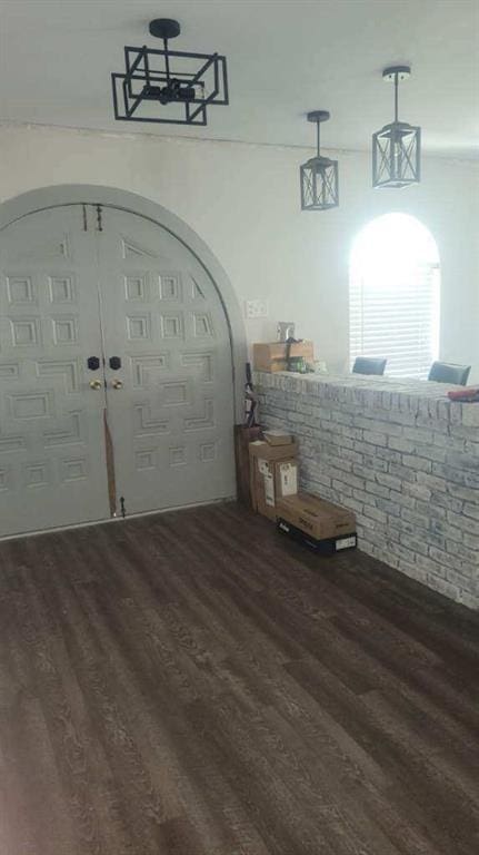 foyer entrance with dark wood finished floors