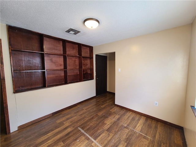 9 Whitney Ave Unit N, Harvey, LA 70058 - empty room with dark wood finished floors and baseboards