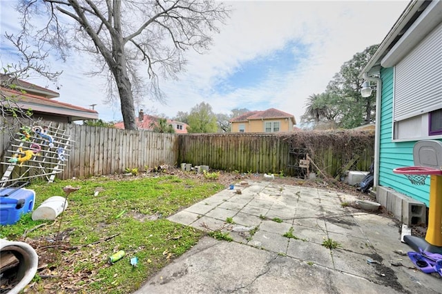 view of yard featuring a fenced backyard and a patio area